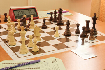 Chessboard close-up. Figures on the board. Competition tournament concept.