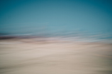 Fototapeta na wymiar blurred motion view of beach scene