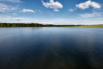 landscape with lake and blue sky
