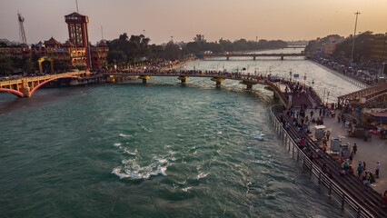 ganges river bank with devotee crowed at evening from flat angle aerial