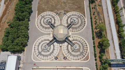 Aerial drone top down photo of latest technology sewage round reservoir waste water tanks in industrial sewage plant