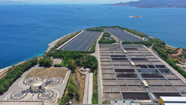 Aerial drone photo from island of Psitaleia the largest sewage treatment plant in Europe, Saronic gulf, Peiraeus, Attica, Greece
