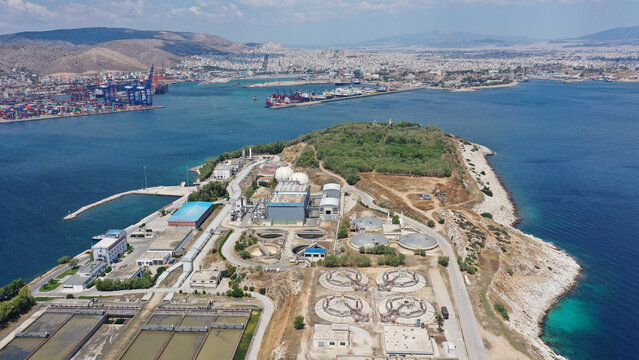 Aerial drone photo from island of Psitaleia the largest sewage treatment plant in Europe, Saronic gulf, Peiraeus, Attica, Greece