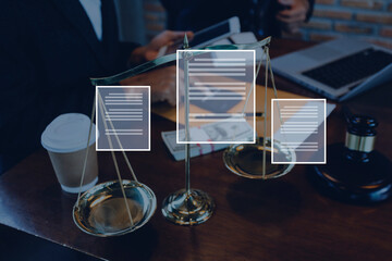 Naklejka premium Justice and law concept.Male judge in a courtroom with the gavel, working with, computer and docking keyboard, eyeglasses, on table in morning light