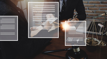 Justice and law concept.Male judge in a courtroom with the gavel, working with, computer and...