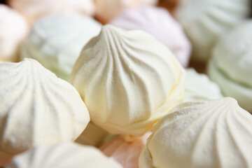 Freshly air marshmallow according to a classic recipe at a confectionery factory, lies for sale to customers