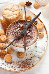 Composition with  mug of cocoa and tasty almond cookies