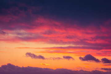 Fototapeta na wymiar Beautiful colorful dramatic sky with clouds at sunset or sunrise