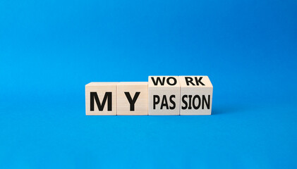 My work My passion symbol. Wooden cubes with words My work My passion. Beautiful blue background....