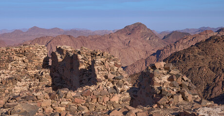 View from the Jebel Abbas Pasha toward the mount Sinai, the sacred place for three religions: Christianity, Judaism, Islam. Ruins of an unfinished palace of Egypt’s viceroy Abbas Pasha at foreground.