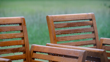 wooden bench on a rainy day