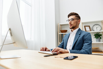 Fototapeta premium businessmen at the desk in the office an official isolated background
