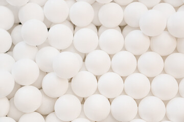 lots of white plastic balls for dry pool. 