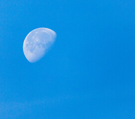half moon on a blue sky