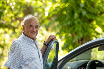 older senior man in the car