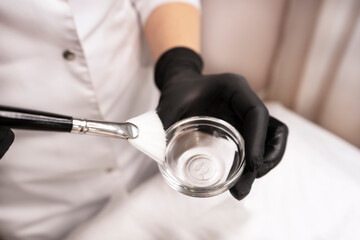 Moisturizing rejuvenation alkaline facial peeling mask. Medicine and cosmetology. Beautician's...