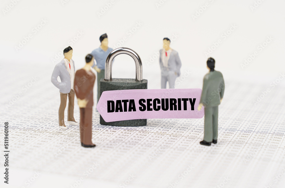 Poster there are figures of people on business reports, a padlock with a sticker on which it is written - d