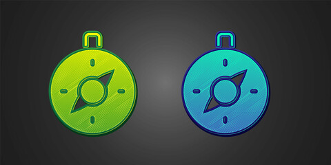 Green and blue Compass icon isolated on black background. Windrose navigation symbol. Wind rose sign. Vector