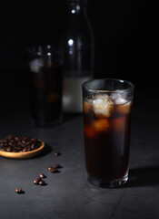 Cold coffee with ice in low key