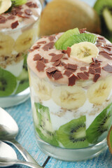 Trifle desserts with bananas, kiwi and yogurt	