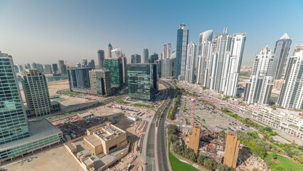 Fototapeta na wymiar Bay Avenue with modern towers residential development in Business Bay aerial panoramic timelapse, Dubai