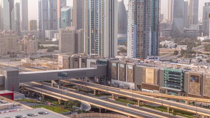 Row of the tall buildings around Sheikh Zayed Road and DIFC district aerial timelapse in Dubai