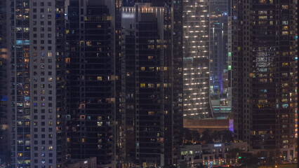 Skyscrapers at the Business Bay in Dubai aerial night timelapse, United Arab Emirates