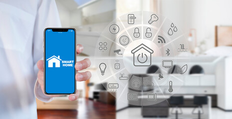 Man hand show smartphone smarth home GUI control every room in house. Hand use smart screen smart home automation assistant on a virtual screen and a user touching a button