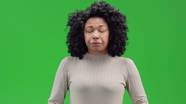 drowsy african american woman tired and overworked early morning Isolated on Green Screen