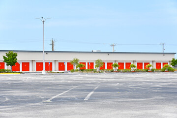 A single story rental locker facility with a long row of drive up personal self storage units located in the southeast United States. 