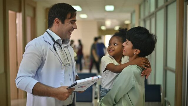 pediatrician hold stethoscope exam child girl patient visit doctor with mother, black pediatrician check heart lungs of kid do pediatric checkup in hospital children medical care concept