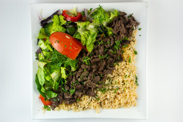 Beef Shawarma with rice and salad. 