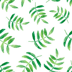 Seamless simple pattern with green leaves chaotically arranged on a white background. Painted in watercolor.