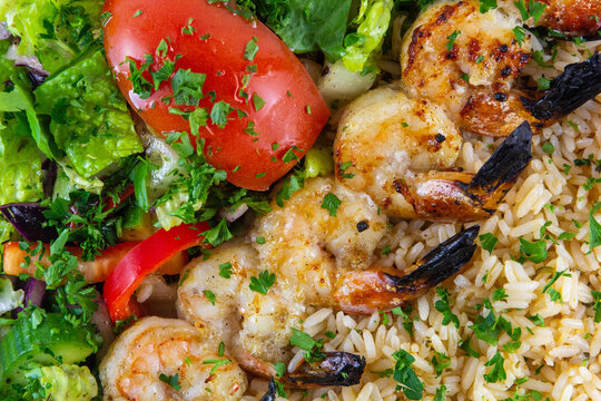 Shrimp Skewer close up with salad. 