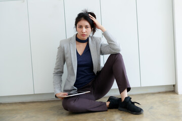 Portrait of freelance smart business women and tablet on holding hand sitting in modern office, portrait and relax style