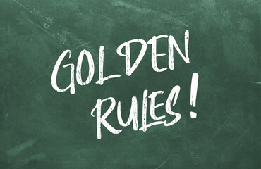 Obraz premium Text Golden Rules written on the green chalkboard