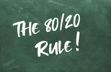 Text The 80 20 Rule written on the green chalkboard