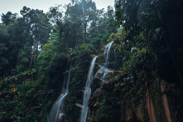 Waterfall in the tropical forest in the rainy season
