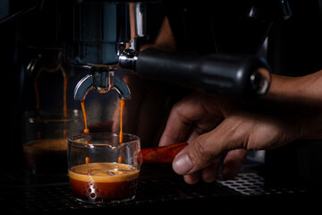 coffee brewing by espresso machine.