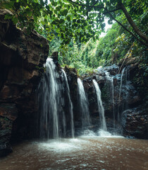 Obraz premium Waterfall in the tropical forest in the rainy season