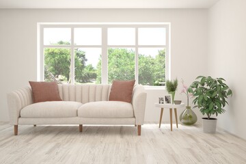 White living room with sofa and summer landscape in window. Scandinavian interior design. 3D illustration