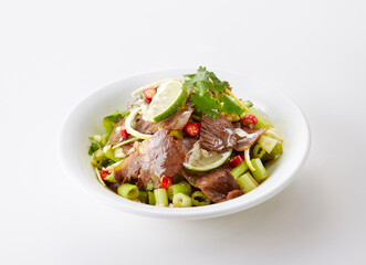 Delicious Chinese food, cold salad with lemon and beef tendon