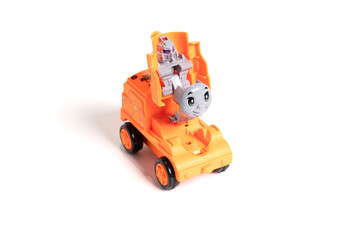 Fototapeta premium Colorful plastic train, isolated on white background.