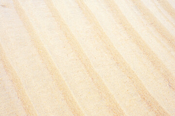 Sand dunes close-up top view, texture and natural background.