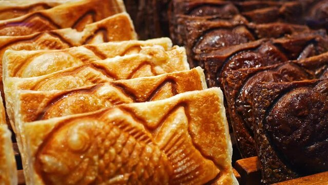 Close-up view of the Croissant Taiyaki, it is a traditional Japanese fish-shaped cake that&rsquo;s usually filled with red bean paste.