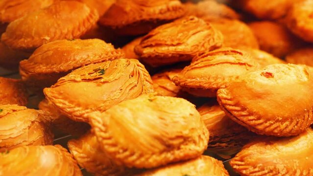 Close-up view of the delicious chicken curry puffs.