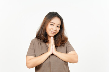 Obraz premium Doing Namaste Greeting of Beautiful Asian Woman Isolated On White Background