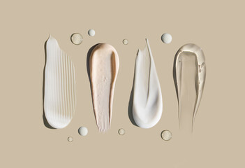 cosmetic smears of creamy texture on a pastel background - obrazy, fototapety, plakaty