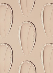 pattern texture gel serum smear cosmetic on beige background
