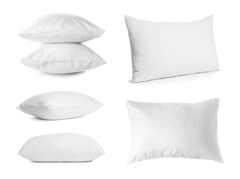 Set with soft pillows on white background
